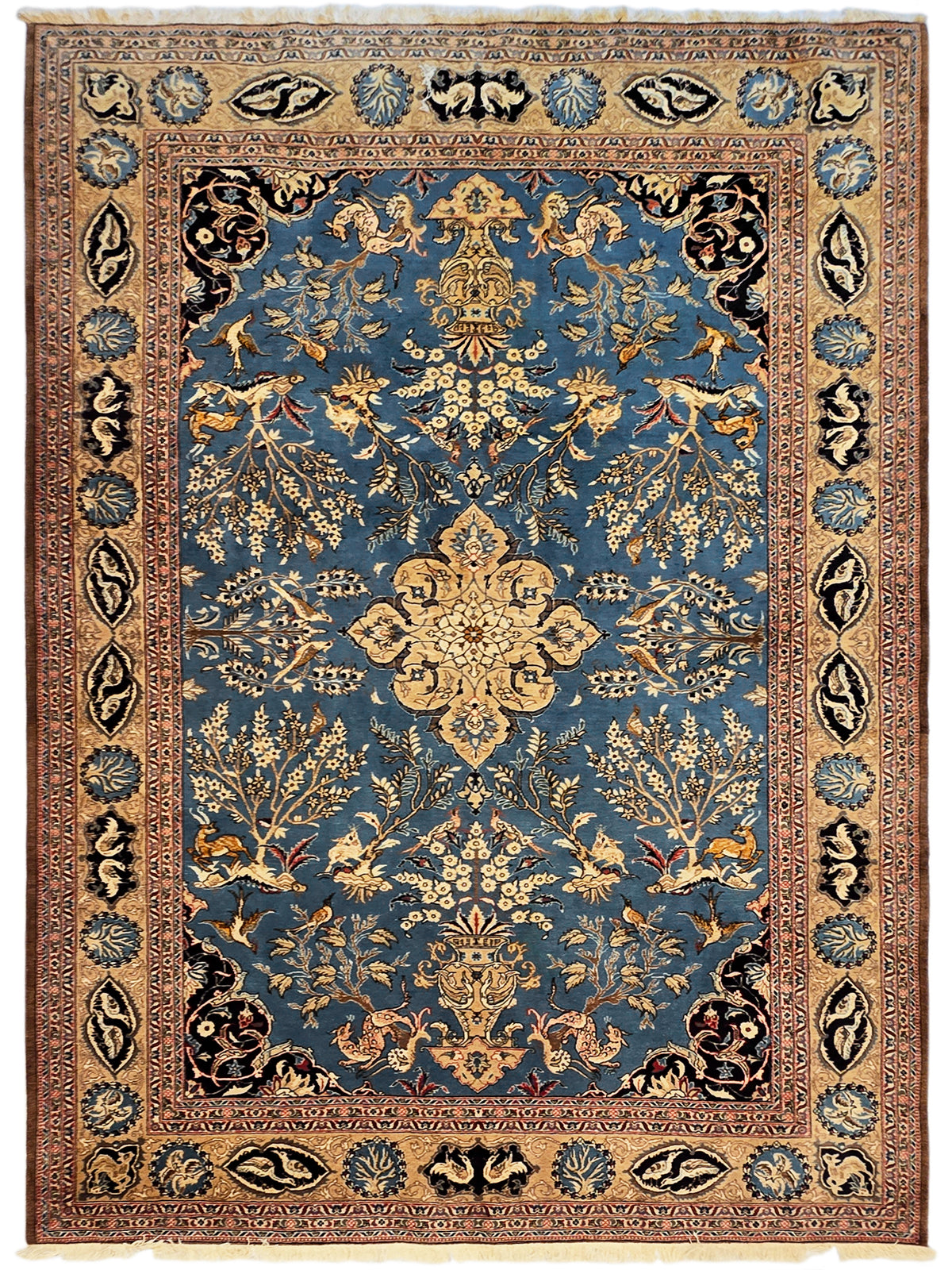 Full view blue and brown ornate rug with central medallion and border