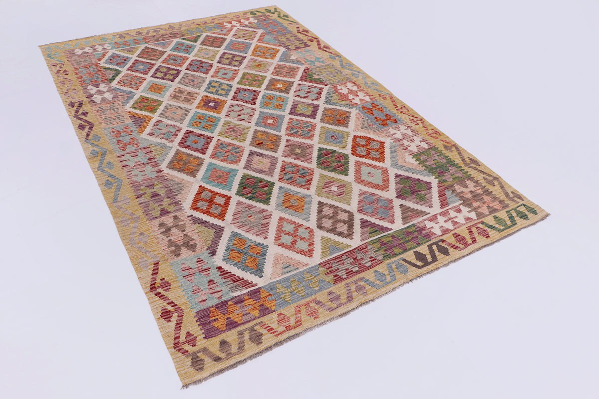 Beige kilim rug angled view with multicolor geometric pattern and border trim