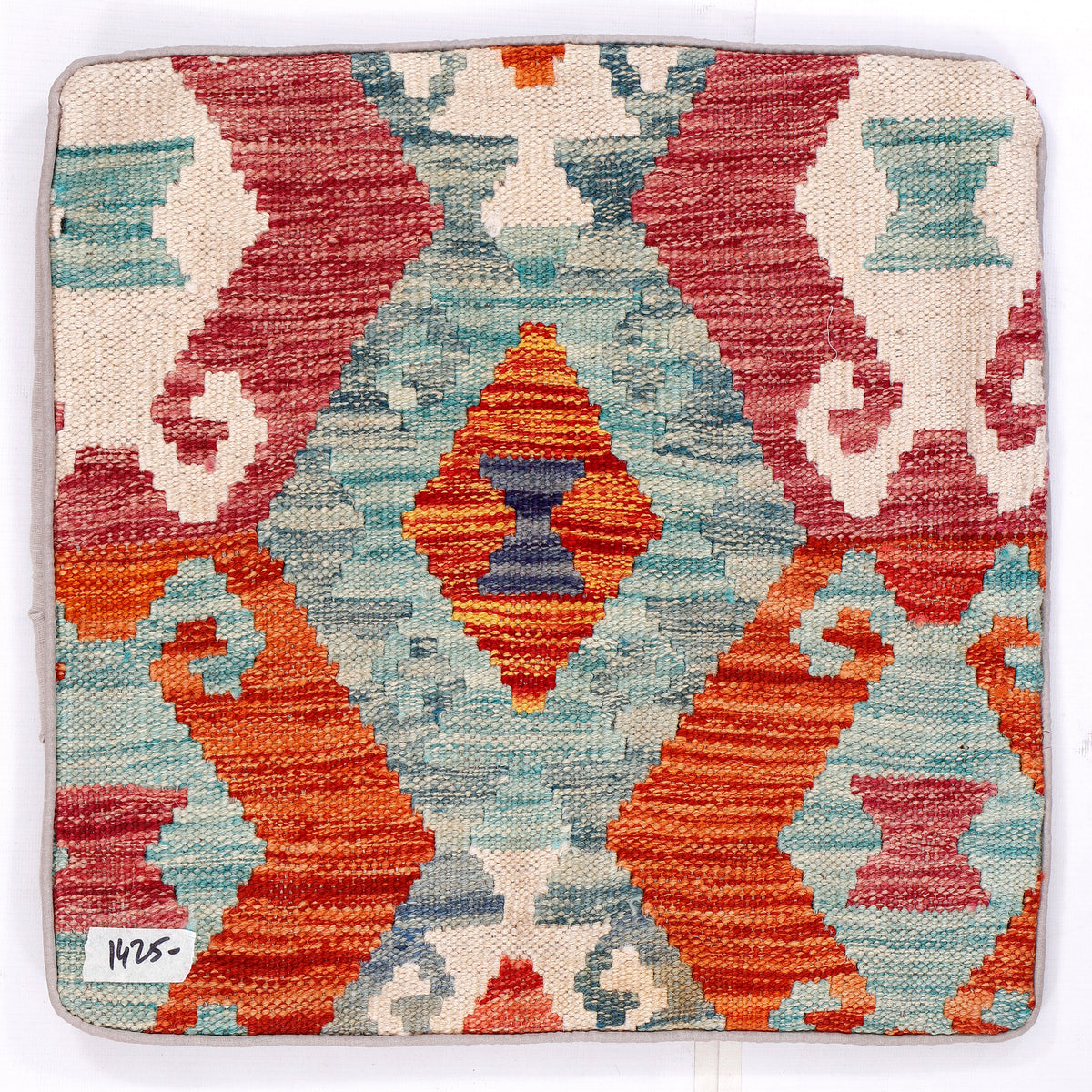45x45 kilim cushion front close-up with red, teal, orange, and white geometric pattern