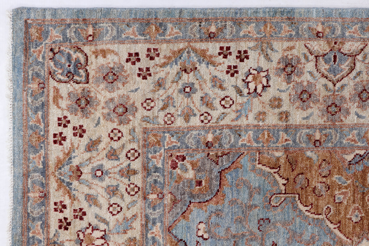 Rug border and medallion design close-up with blue field and red geometric motifs