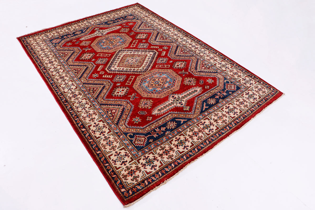 Red, blue, and beige rectangular Persian-style rug with medallion center