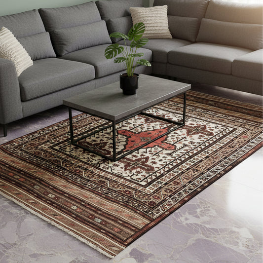 Soumak rug with geometric pattern, red and cream medallion, and dark border lines