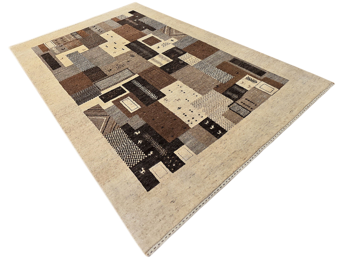Patchwork rug, beige border with brown and black square and stripe motifs