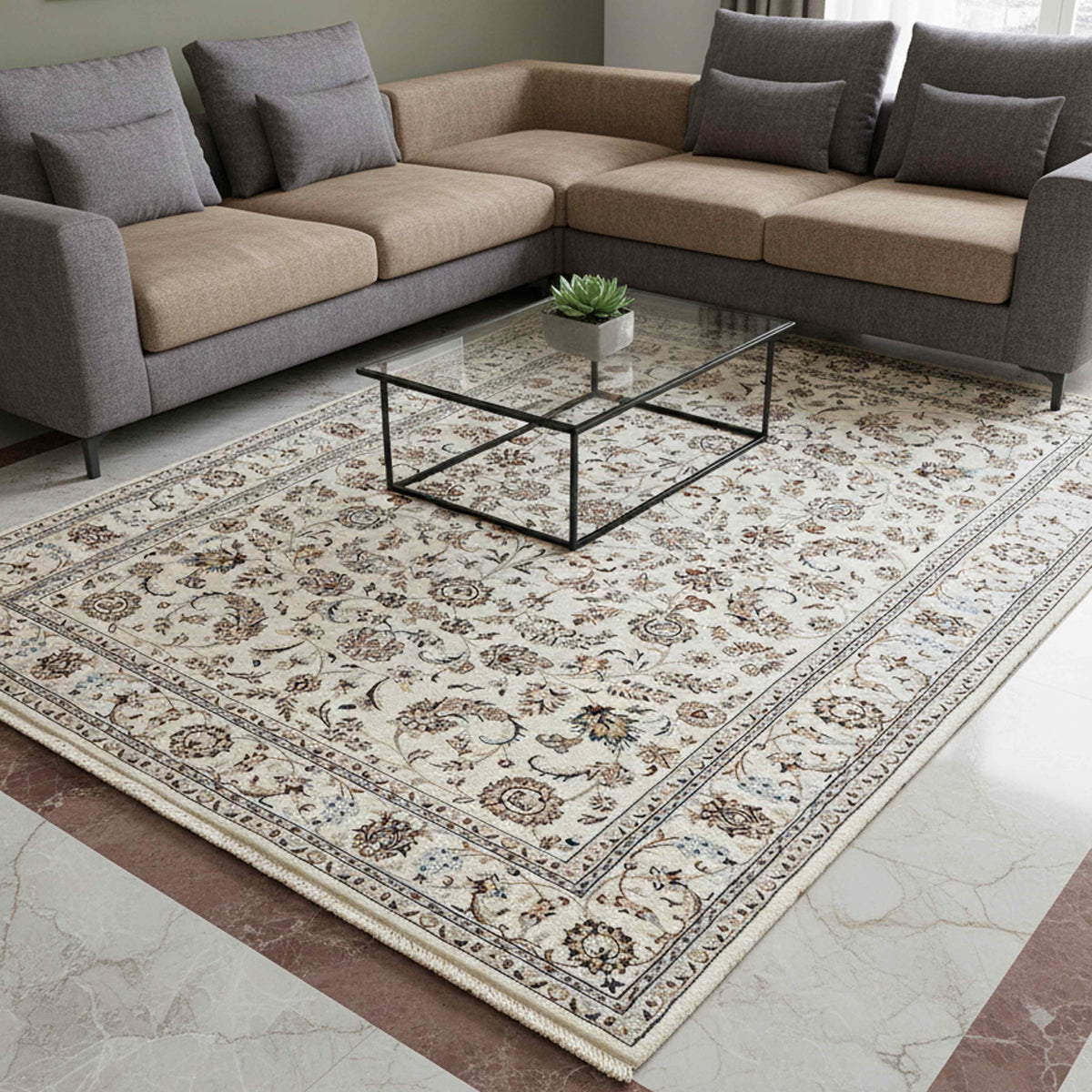 Floral cream rug with blue patterned border, laid flat in a living room setting