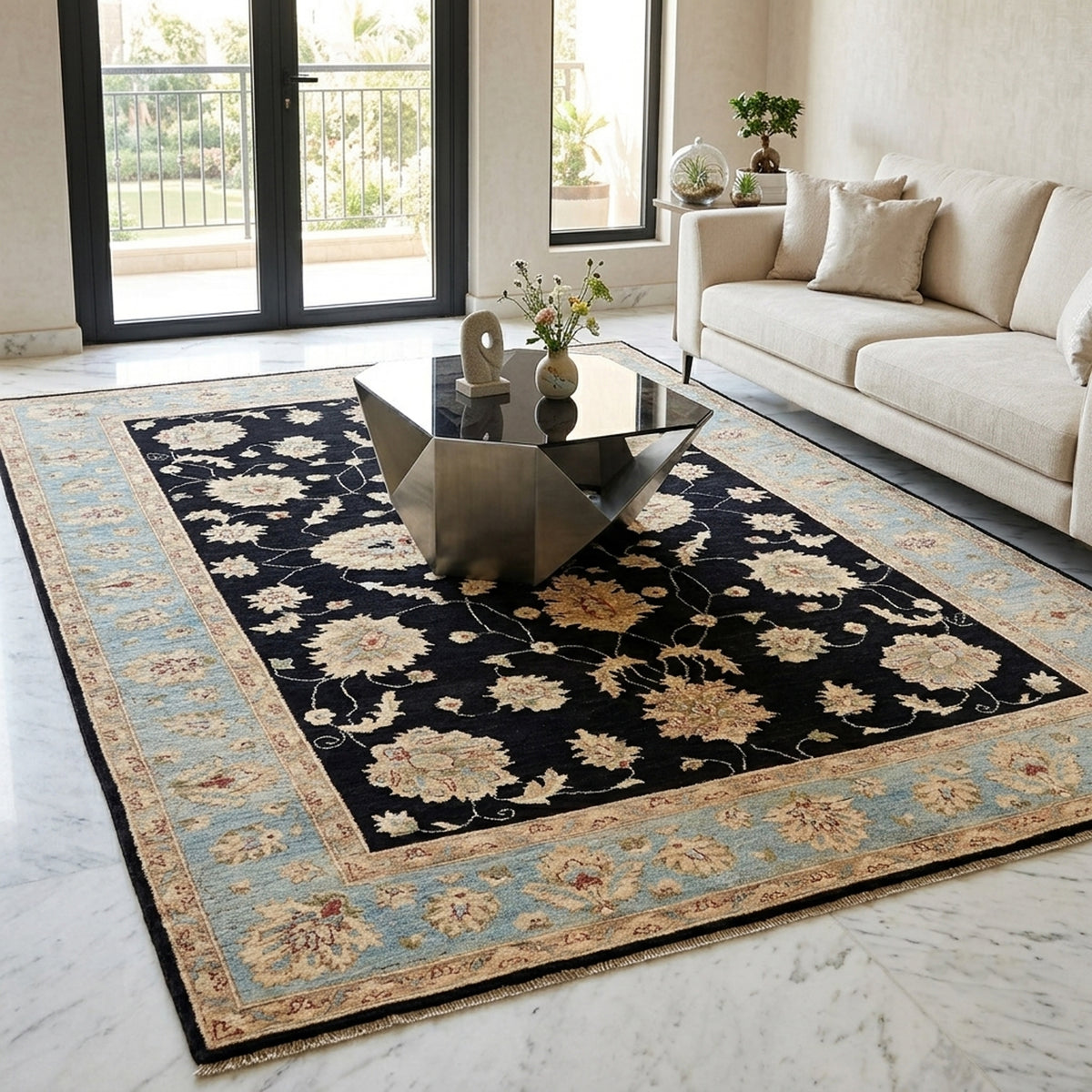 Black floral rug with light blue border, cream blossoms and vine lines