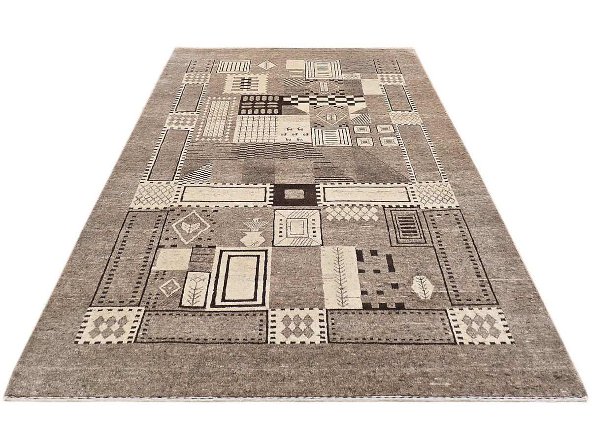 Geometric patchwork rug with central diamond and rectangle motifs in gray and beige