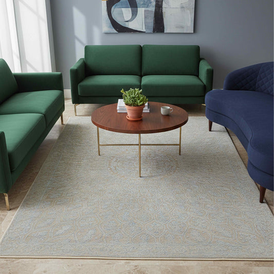 Light blue-gray patterned area rug placed on a floor in a living room setting.