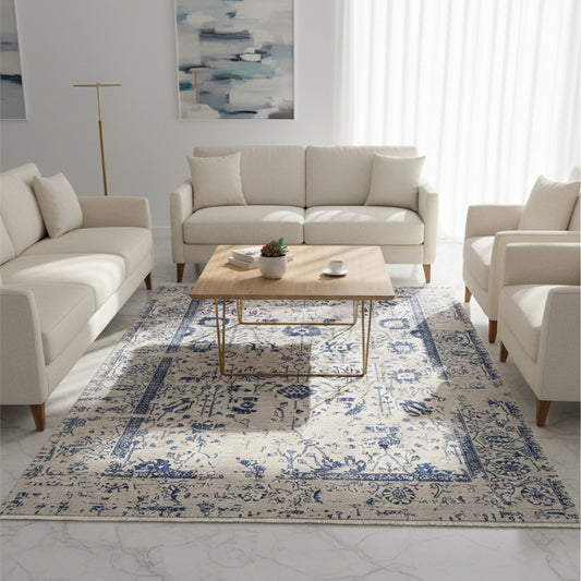 Beige and blue patterned area rug with ornate border, flatweave style.