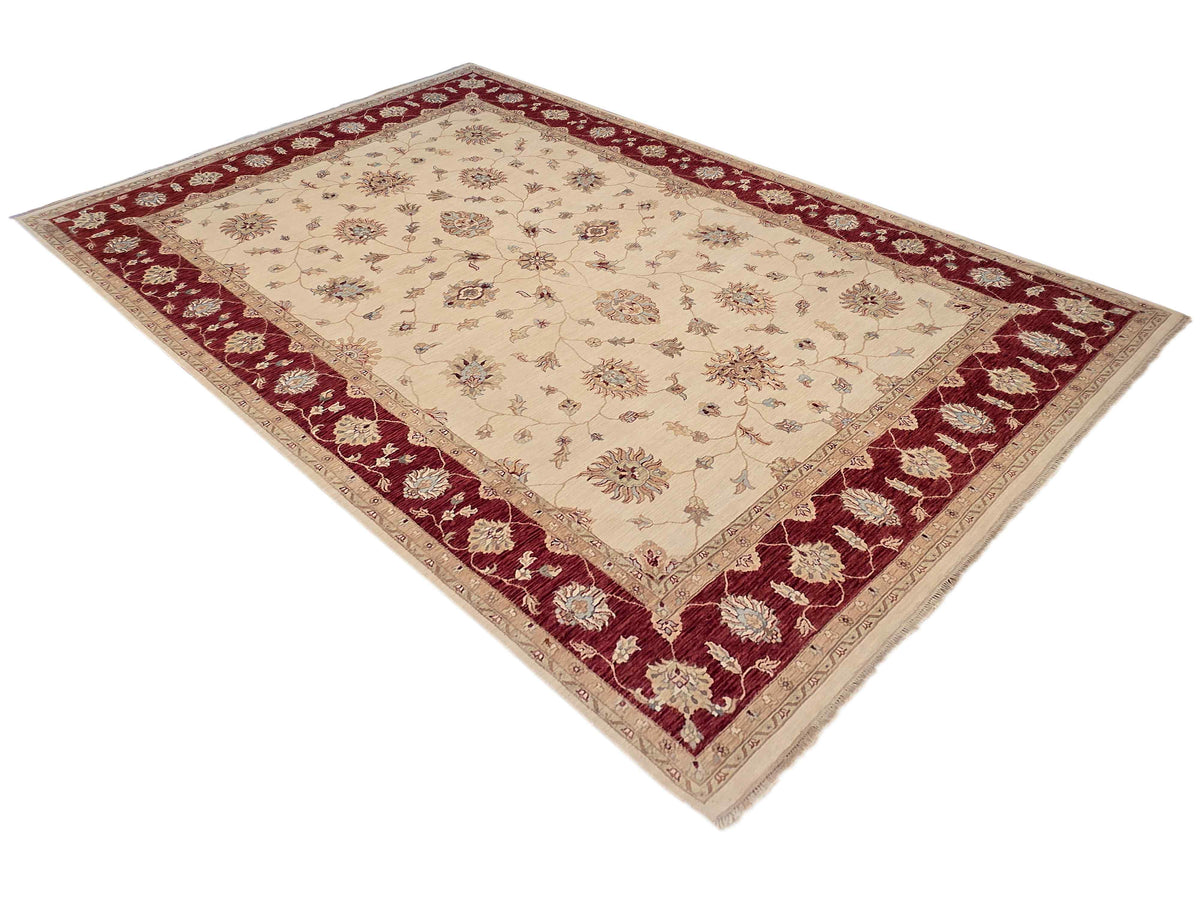 Square rug with cream center and burgundy frame, dense floral and geometric motifs