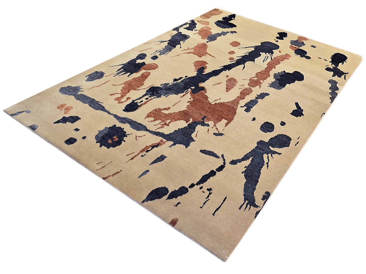 Beige abstract area rug with blue and rust figure-like paint marks