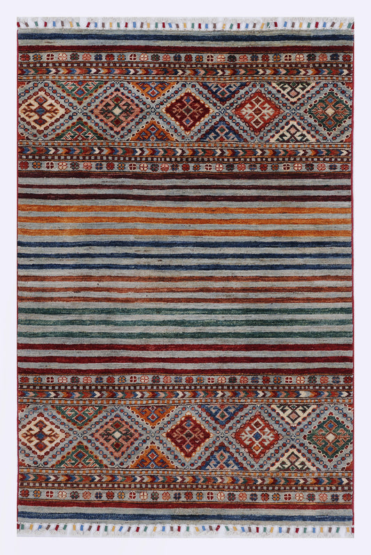 Beige geometric area rug with diamond medallions and border stripes, fringed ends