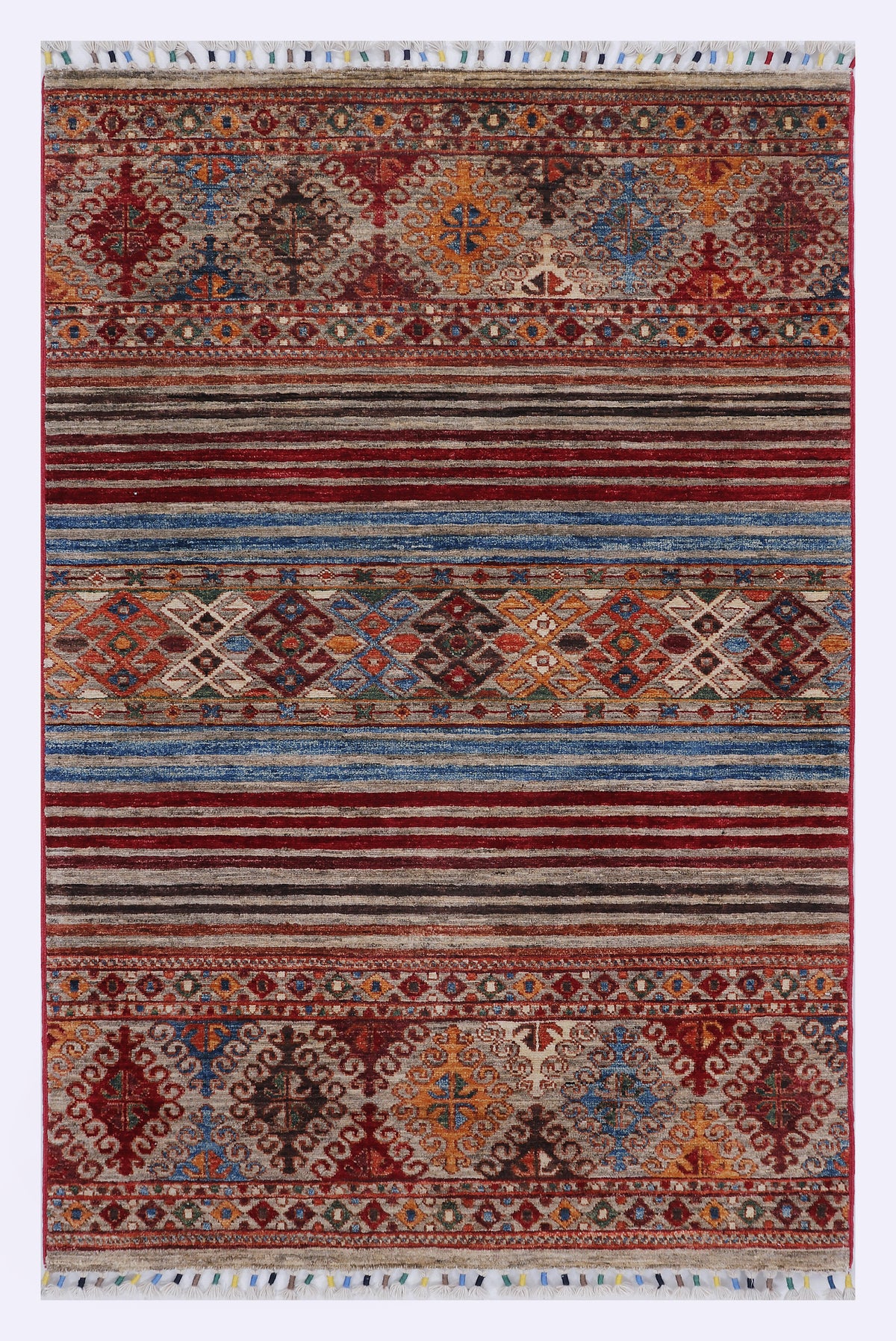 Red patterned rug, 153x99 cm, with geometric bands and border.
