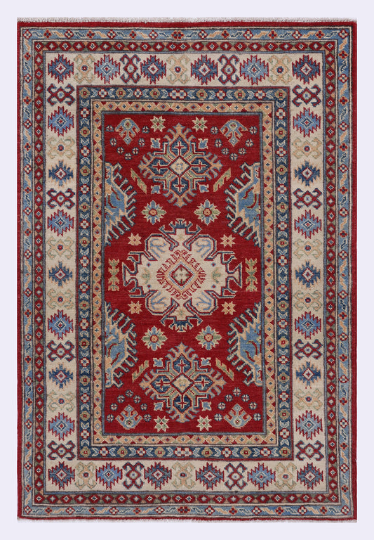 Red geometric patterned rug, 147x99 cm, ornate border