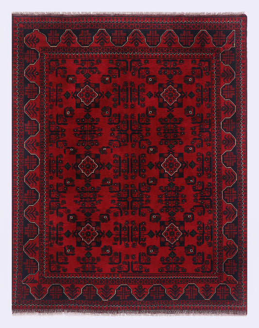 Red rectangular rug with geometric medallions and ornate border pattern