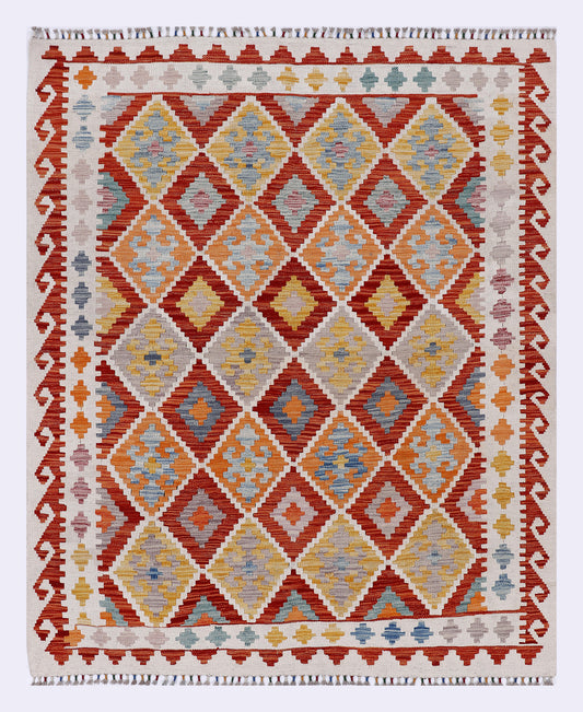 Red kilim rug with multicolor diamond pattern and fringed border, rectangular.