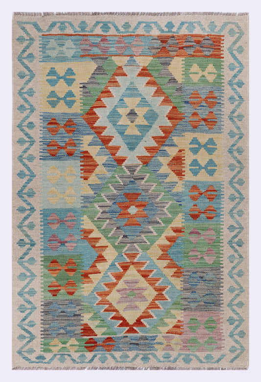 Geometric flatweave rug in light blue with multicolor diamond and zigzag motifs