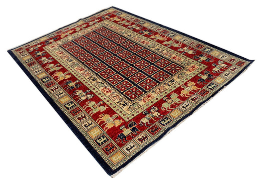 Ornate area rug with red and cream center, blue outer border, flat weave