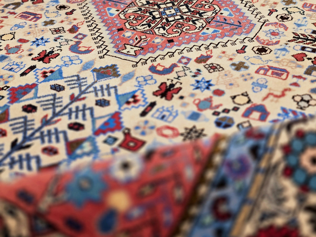 Abadeh rug, 200x300 cm, cream field with red, blue, and diamond motifs