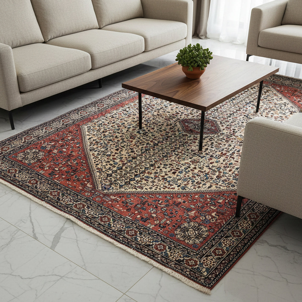 Rectangular Persian-style area rug with red, cream, and navy floral medallion border