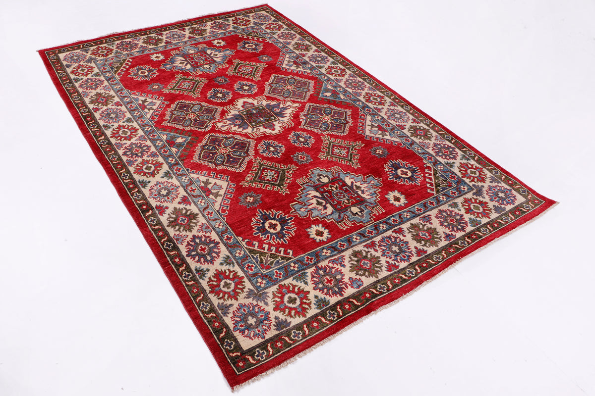 Red traditional area rug with ornate medallion pattern and dark border, 243x163 cm