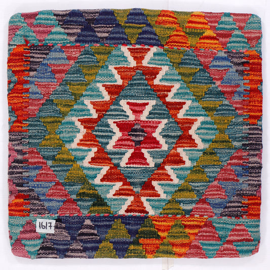 Geometric kilim cushion cover close-up with multicolor diamond medallion pattern