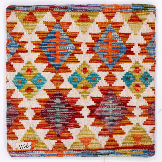 Kilim cushion cover front, multicolor diamond pattern in orange, blue, teal, and yellow