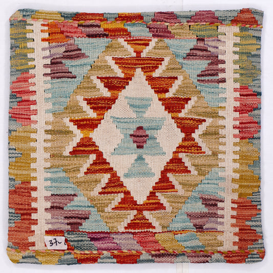 Kilim cushion front with close geometric diamond pattern in red, blue, gold, cream