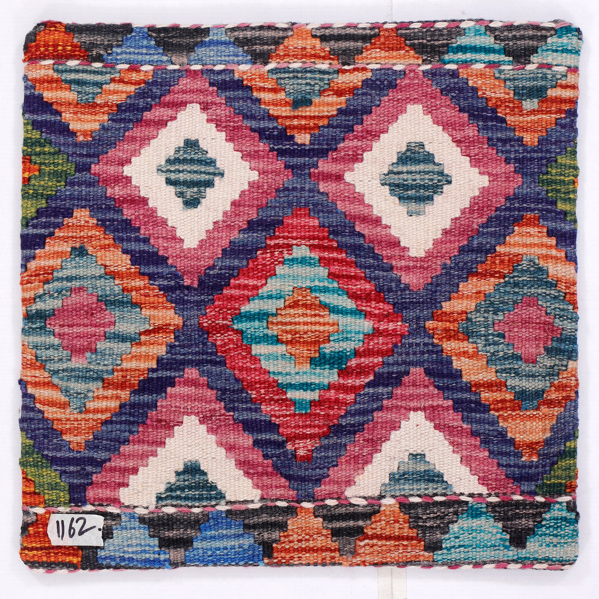 Kilim cushion cover featuring multicolor diamond geometric pattern, square front