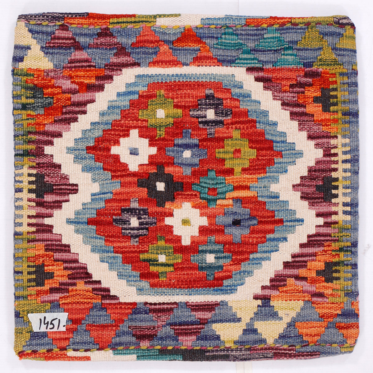 Red kilim cushion with central medallion motif and geometric border, 45x45 cm
