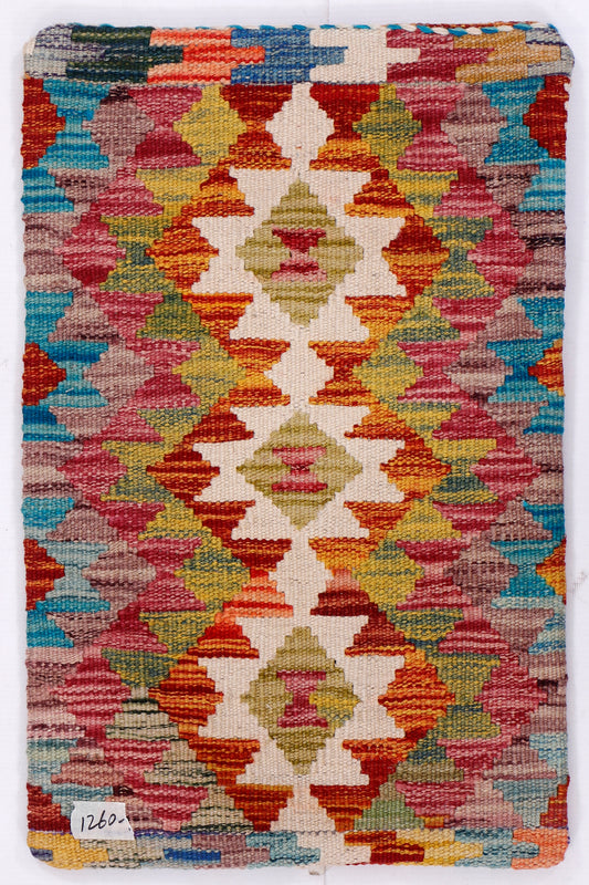 Kilim cushion cover close-up of multicolor geometric weave pattern