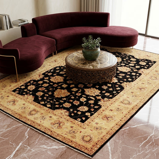 Afghan rug on floor: black floral medallion with beige border and detailed geometric accents.