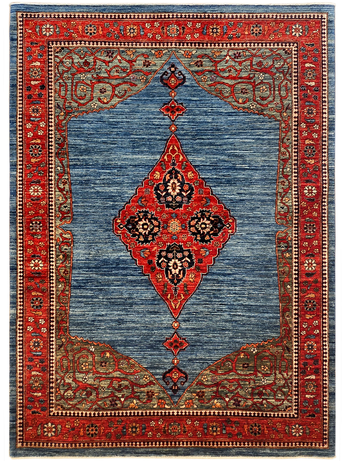 Large blue area rug with red central diamond medallion and classic ornamental border.