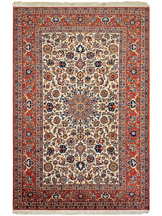 Rectangular rug with red border and cream center filled with ornate floral motifs