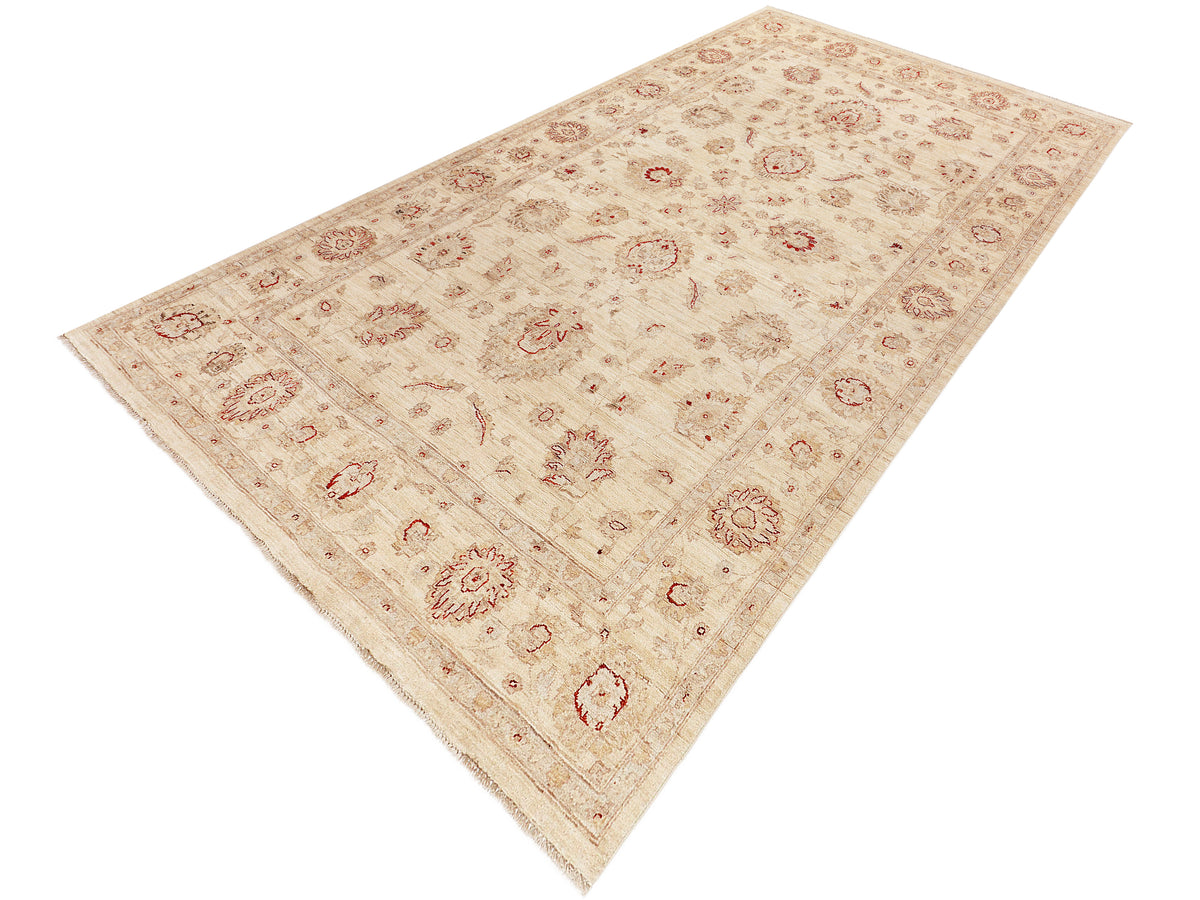 Afghan rug corner view with cream field and red floral medallions