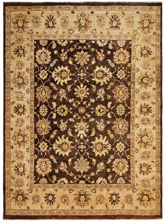 Decorative rug with central dark floral medallion on tan background; patterned border