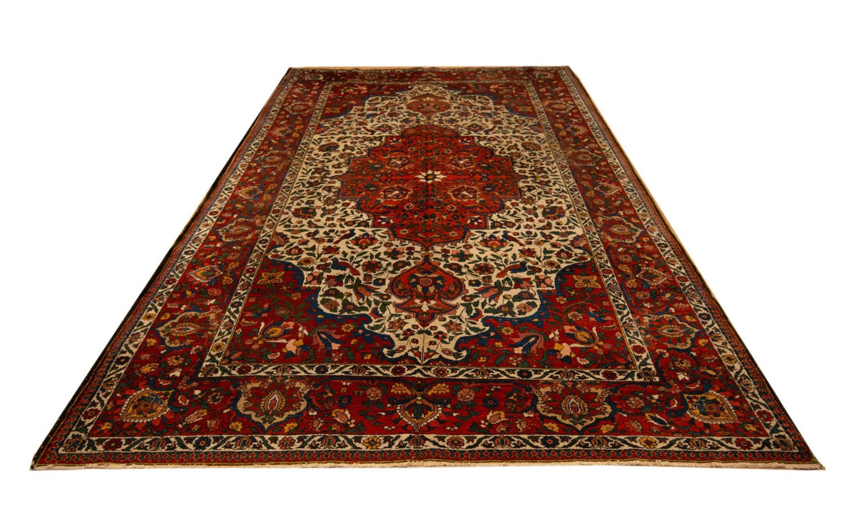 Bakhtiari rug with red central medallion and ornate multicolor border