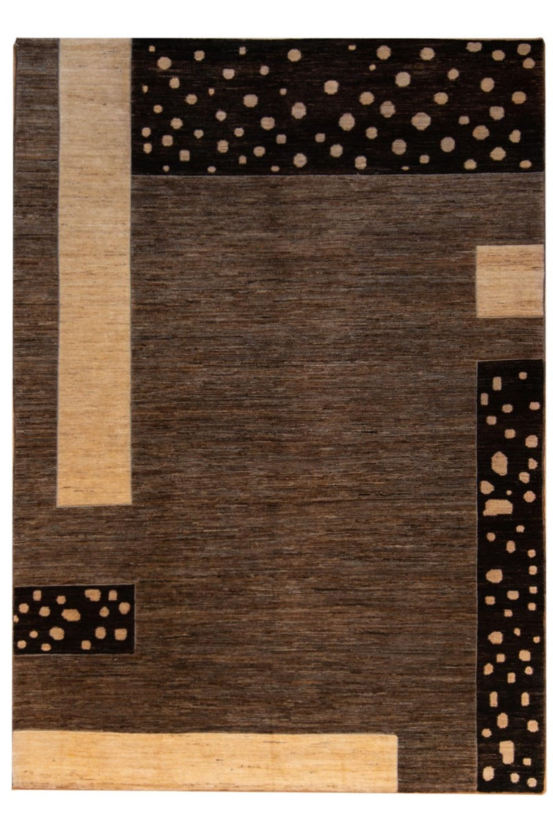 Geometric area rug with dark brown and beige blocks and dot accents