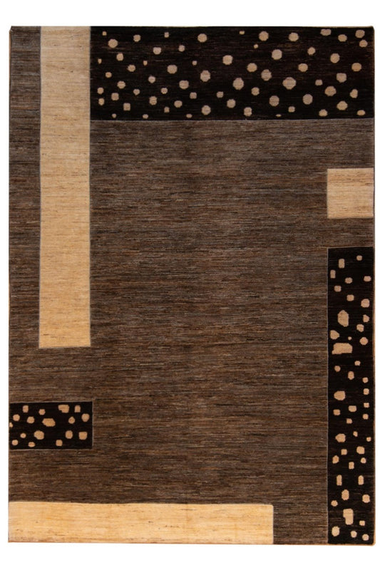Geometric area rug with dark brown and beige blocks and dot accents