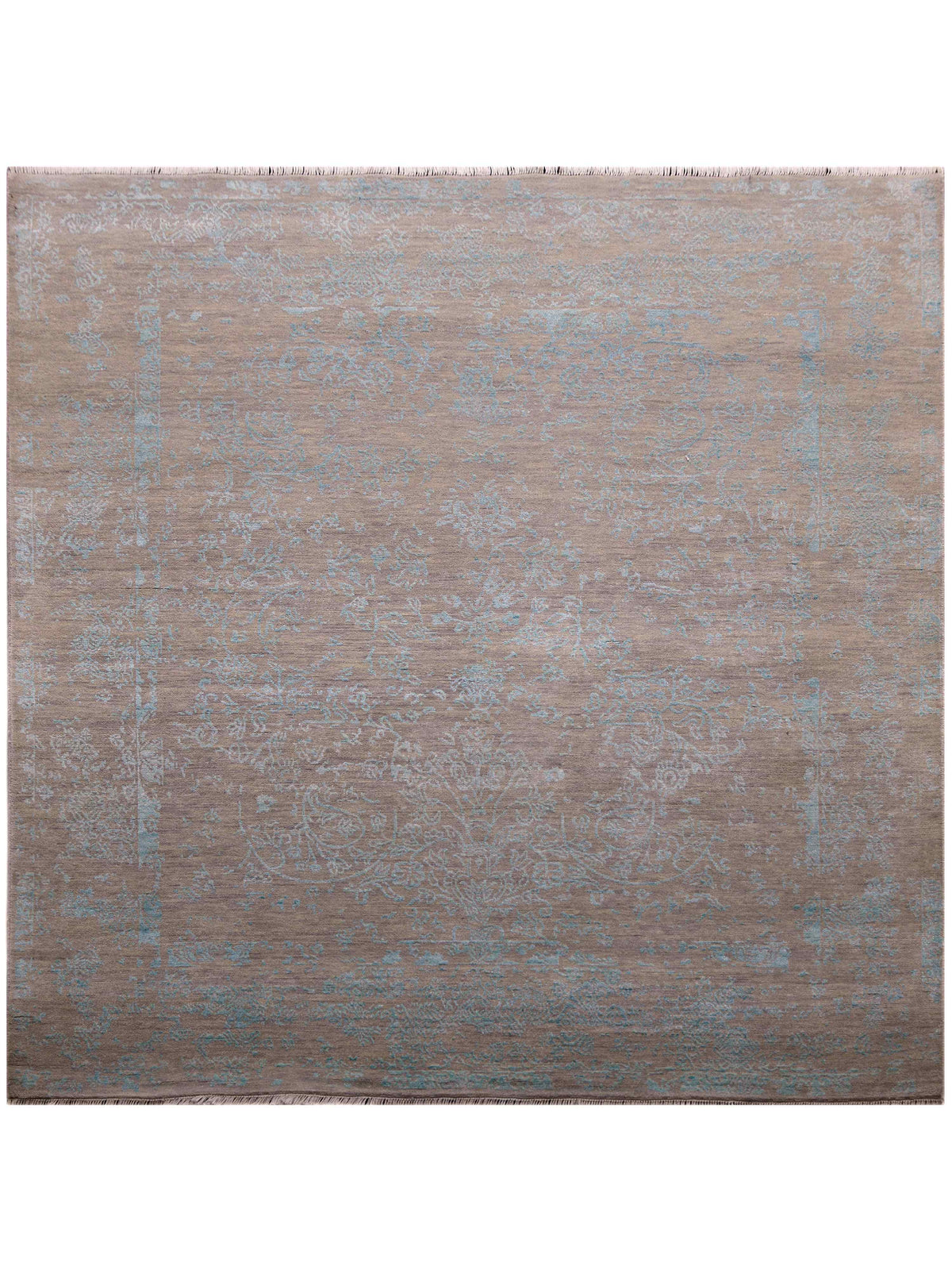 Square modern area rug with distressed tan and muted blue abstract pattern, flat weave