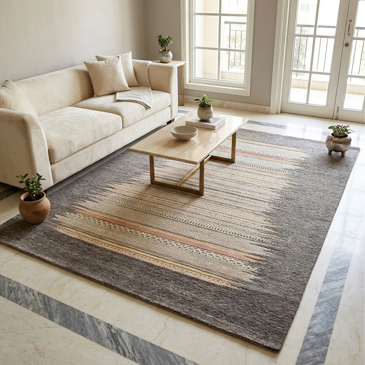 Grey rug with multicolor striped border and flat woven texture