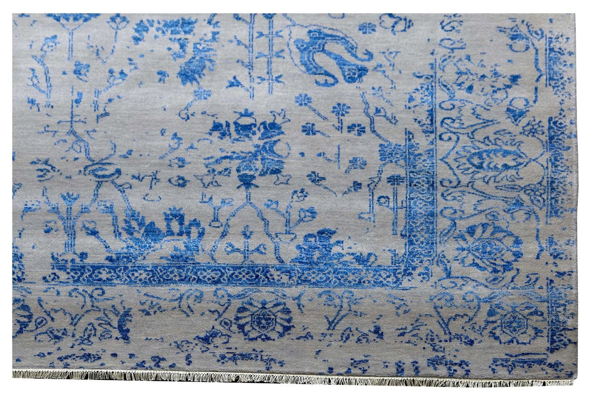 Blue and white patterned area rug, close view of decorative medallions
