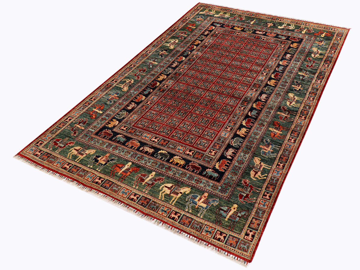 Rectangular rug with dark green field, red border, and central medallion.