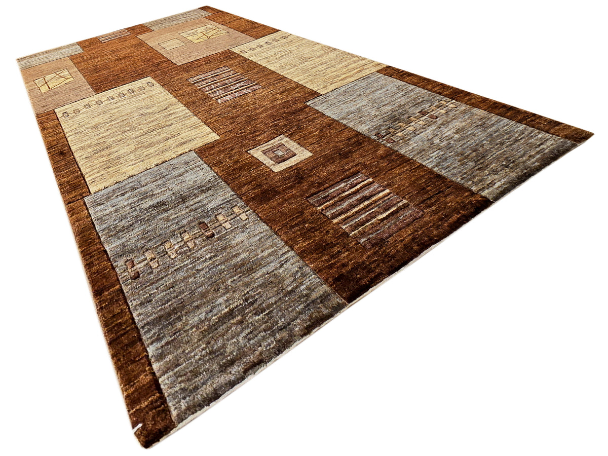 Geometric patchwork area rug with brown center blocks and gray-beige sections