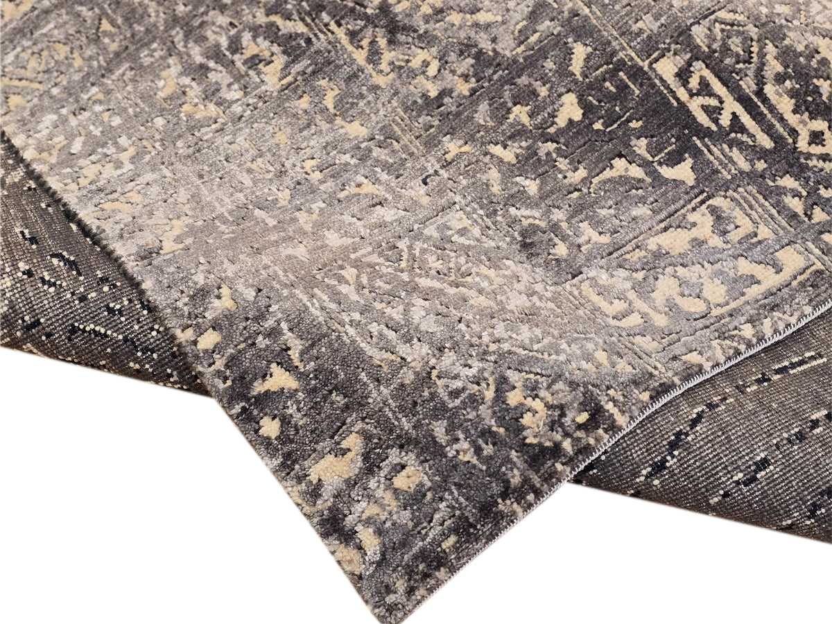 Beige and dark navy rug with distressed motif and stitched edge border, 231x167 cm