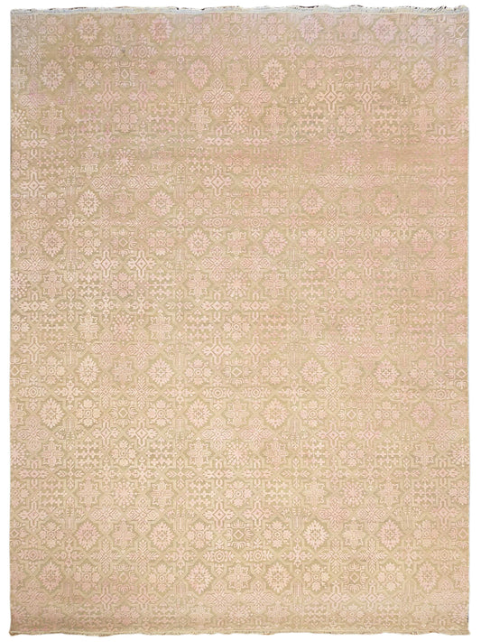 Beige area rug with soft pink and cream repeating geometric floral motifs, flat-woven