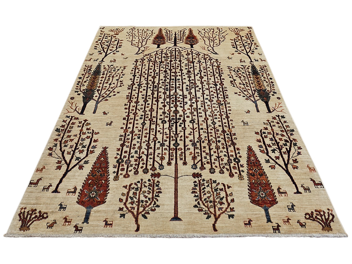 Off-white rug with central vertical design, leafy branches, and small animal motifs