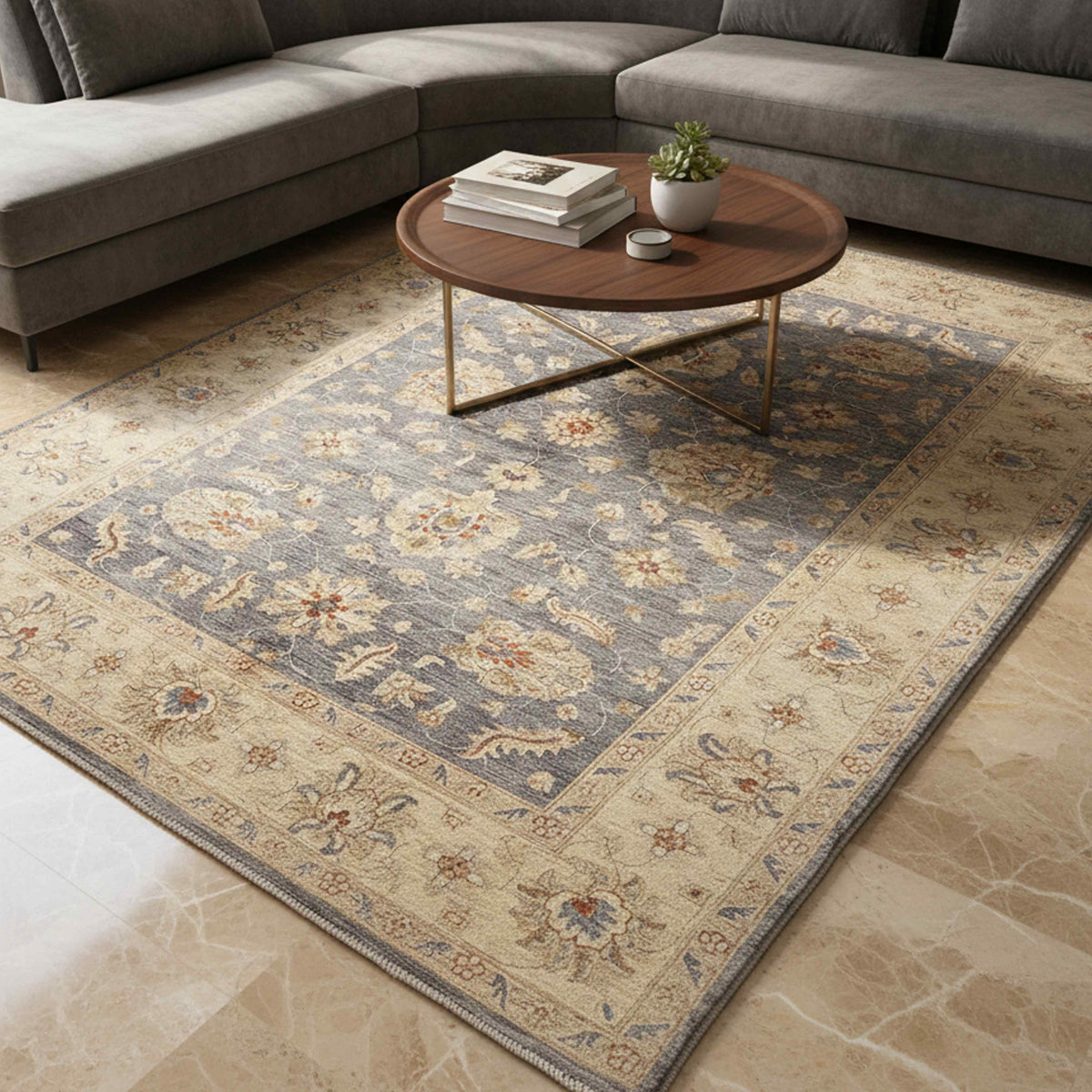 Blue, beige and orange floral area rug with ornate medallion pattern and border