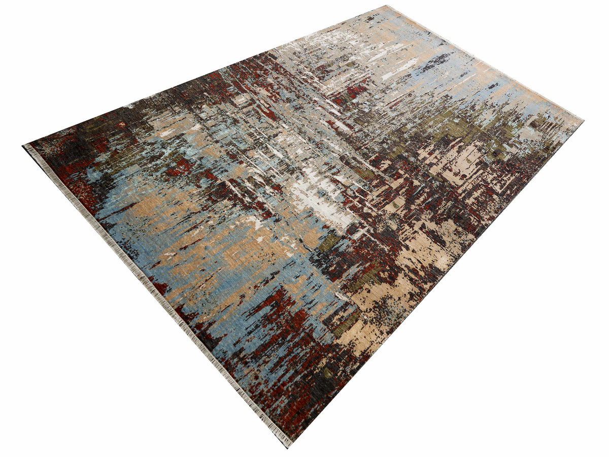 Abstract area rug with distressed beige, blue, rust and dark brown pattern.