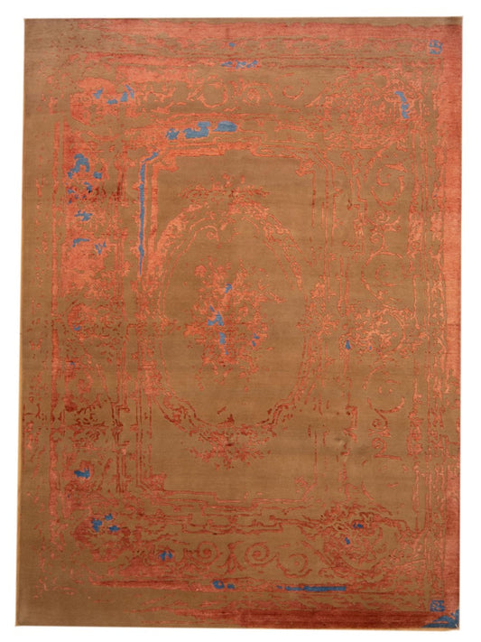 Orange modern area rug with blue ornate medallion pattern, rectangular, textured pile.