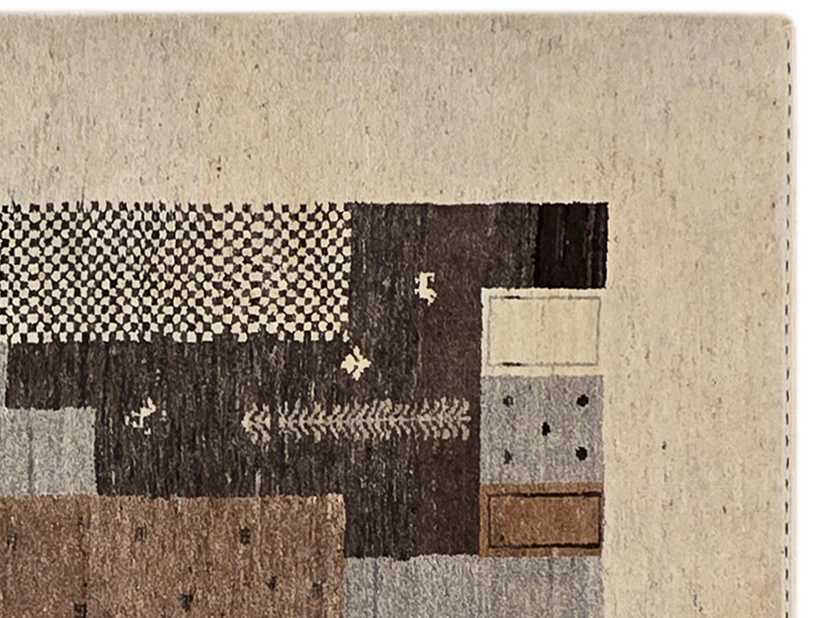 Abstract patchwork Persian-style rug with beige, brown, and black geometric blocks